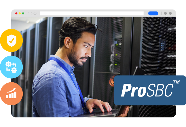 A man at a data center using a laptop with the ProSBC logo.